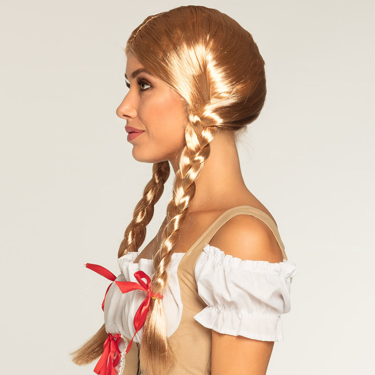 Op deze afbeelding zie je een Accessoires, van het merk Boland. Pruik Onschuldige Heidi Blond