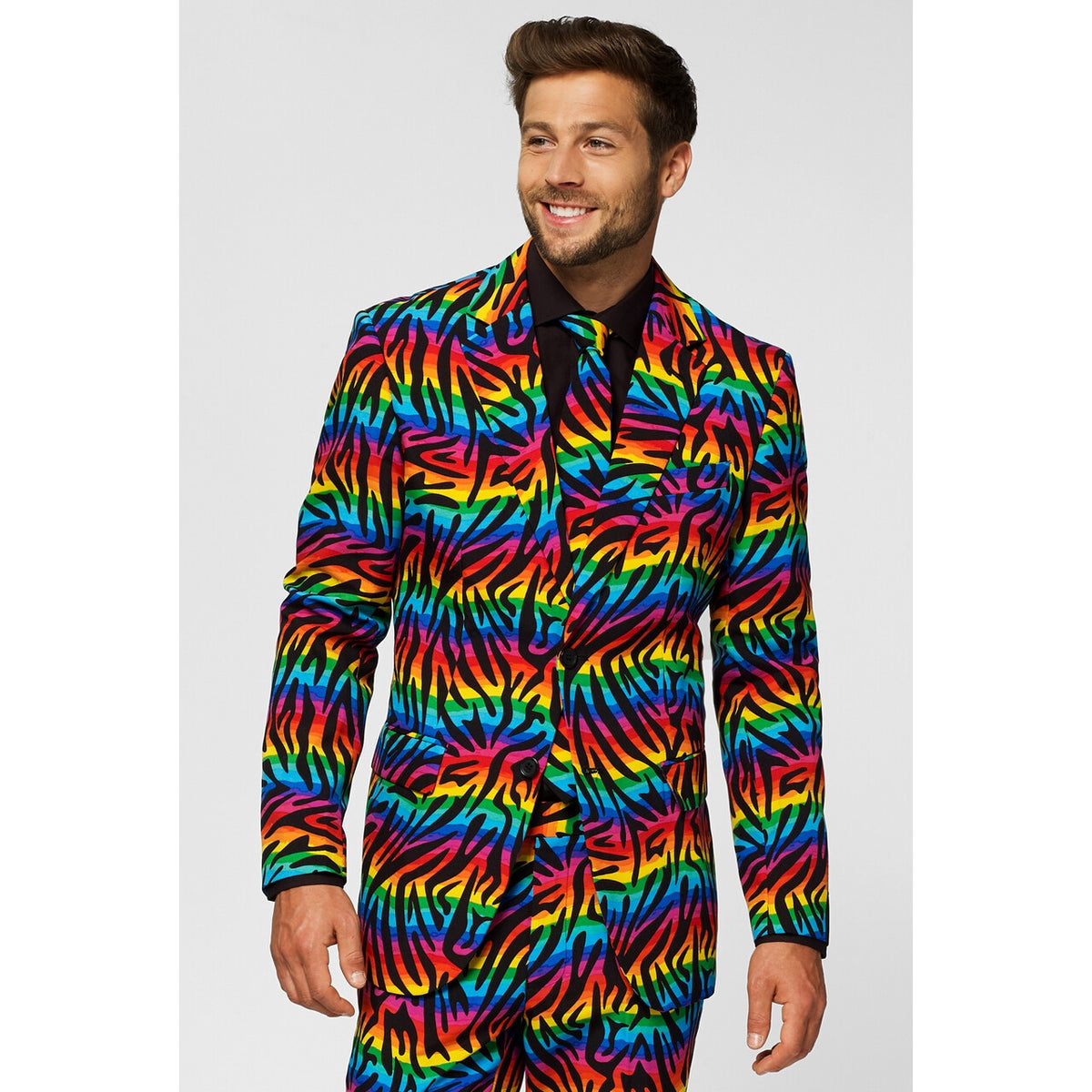 Op deze afbeelding zie je een Kostuums, van het merk Opposuits. Wild Rainbow Man Kostuum